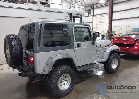 2000 Jeep Wrangler Sport z USA, uszkodzony, nr VIN 1J4FA49S2YP797321